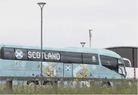  ??  ?? 0 Scotland’s team bus parks up as the players train at Rockliffe Park