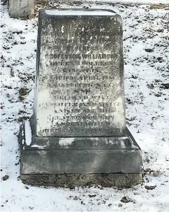  ?? SANDY BERG ?? At the grave site of Sir John A. Macdonald in Kingston, Ont., a marble stone in the family plot is barely legible.