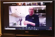  ?? MICHILEA PATTERSON – FOR MEDIANEWS GROUP ?? Chef Chris Welsh leads a cooking class through Zoom with a group of Schuylkill River Greenways staff members.