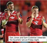  ?? ?? Dan Jones and Sam Costelow celebrate the Scarlets’ win on Friday night.