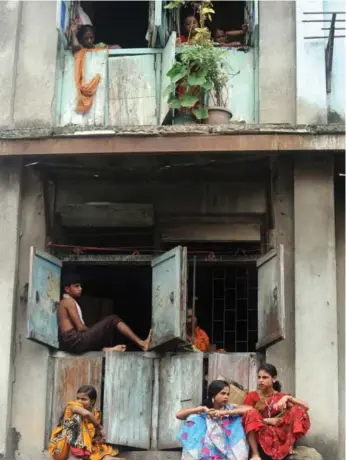  ?? PAL PILLAI/AFP/GETTY IMAGES FILE PHOTO ?? Kamathipur­a is a notorious red-light district in Mumbai, where Bombay Teen Challenge runs a night shelter.