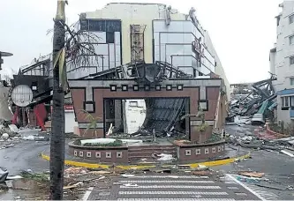  ?? ANNA MAZUR/GETTY IMAGES ?? The damaged Casino Royale, on the Dutch Caribbean island of St. Maarten, is seen after the passage of hurricane Irma. Irma cut a swathe of deadly destructio­n as it roared through the Caribbean, turning the islands of St. Martin and Barbuda into...