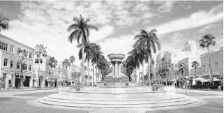  ?? CARLINE JEAN/SOUTH FLORIDA SUN SENTINEL ?? The main fountain stands at Mizner Park in Boca Raton on Thursday. Mizner Park will mark its 30th anniversar­y Monday.