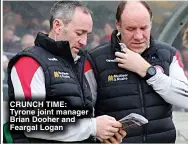  ?? ?? CRUNCH TIME: Tyrone joint manager Brian Dooher and Feargal Logan