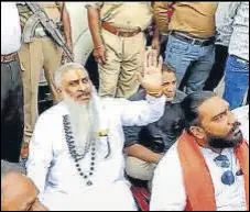  ?? HT ?? Sudhir Suri (centre) seconds before he was shot dead during a sit-in protest in Amritsar on Friday.