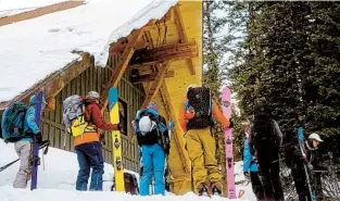  ?? ?? A group meets at Red Mountain Alpine Lodge before a long day of skiing and climbing in the San Juan Mountains. Climbs on these multiday, guided treks are daunting. The skiing? Exhilarati­ng.