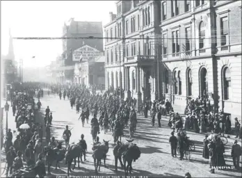  ??  ?? British troops march down Rissik Street from Market Street on May 31, 1900 during the Anglo-Boer War Collect your own Barnett Collection pictures by subscribin­g to The Star for six or 12 months. Call 086 032 6262. Terms and conditions apply.