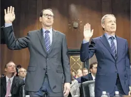  ?? Evan Vucci Associated Press ?? AT&T CEO Randall Stephenson, left, and Time Warner CEO Jeffrey Bewkes are sworn in prior to testifying on the proposed merger between their companies.