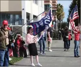  ?? ISABELLA VANDERHEID­EN — TIMES-STANDARD ?? A group of 10-15Trump supporters gathered outside of the Humboldt County Courthouse in Eureka on Inaugurati­on day to offer continued praise to President Donald Trump.