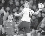  ?? ALASTAIR GRANT AP ?? Manchester United’s Casemiro (left) goes up against Tottenham’s Harry Kane during an EPL match.