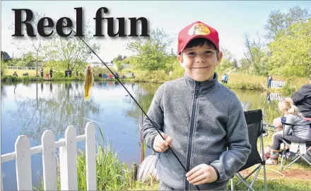  ?? DESIREE ANSTEY/JOURNAL PIONEER ?? Quinn Banfield, aged 8, reels in his third catch of the day.