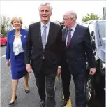  ??  ?? DUNDALK, Ireland: European Commission (EC) member in charge of Brexit negotiatio­ns with Britain, Michel Barnier, center, is shown a border road in Co Monaghan between Republic of Ireland and Northern Ireland.—AFP