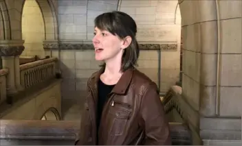  ?? Paula Reed Ward/Post-Gazette ?? Maureen Ciampaglia speaks to the media Wednesday in the Allegheny County Courthouse after Richard Lee Hauschel II was sentenced for causing a 2017 crash on the Liberty Bridge that critically injured her, her husband and their 4-day-old baby.