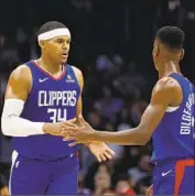  ?? Ringo H.W. Chiu Associated Press ?? TOBIAS HARRIS and some teammates bonded on a trip to Miami this summer, boosting team chemistry.