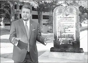  ?? Arkansas Democrat-Gazette/JEFF MITCHELL ?? State Sen. Jason Rapert, R-Bigelow, who sponsored the legislatio­n that led to installati­on of the Ten Commandmen­ts monument on the state Capitol grounds, said Tuesday after the unveiling that the American History & Heritage Foundation, of which he is a...