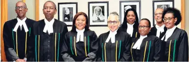  ?? CONTRIBUTE­D ?? President of the Court of Appeal, Justice Dennis Morrison (second left), and former Chief Justice Zaila McCalla (third left) with other judges of the Court of Appeal following a special sitting of the court to honour McCalla on January 26.