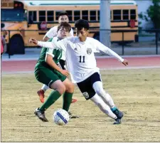  ?? TIM GODBEE / For the Calhoun Times ?? Calhoun’s Daniel Isep (11) moves the ball past a Murray County defender during the first half of Tuesday’s game. Isep had one of two goals in the 2-0 win.