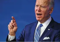  ?? Jim Watson / Getty Images ?? President-elect Joe Biden delivers remarks on the public health and economic crises in a televised address at the Queen Theater in Wilmington, Del.