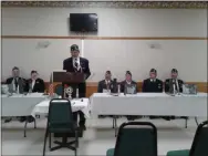  ?? MELISSA SCHUMAN - MEDIANEWS GROUP ?? Saratoga Springs American Legion member Keith Koster presides over the memorial service for the four chaplains.