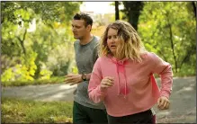  ??  ?? Seth (Micah Stock) and the hard-partying title character (Jillian Bell) run their way to self-actualizat­ion in Brittany Runs a Marathon, a comedy that manages to be uplifting and edgy.