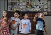  ?? MINDY SCHAUER — STAFF PHOTOGRAPH­ER ?? Pre-k students line up outside their classroom and bid farewell to their parents during the first day of school at Linda Vista Elementary School in Orange on Aug. 16.