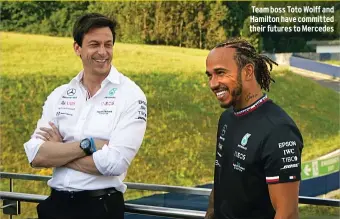  ??  ?? Team boss Toto Wolff and Hamilton have committed their futures to Mercedes