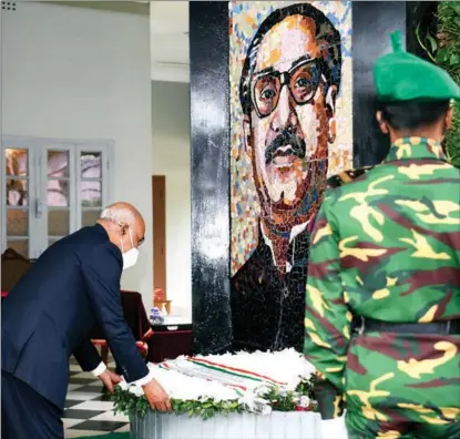  ?? INDIAN PRESIDENTI­AL PALACE / AP ?? Then Indian president Ram Nath Kovind pays homage to Bangladesh’s founding father Sheikh Mujibur Rahman at the Bangabandh­u Memorial Museum, in Dhaka, in 2021.