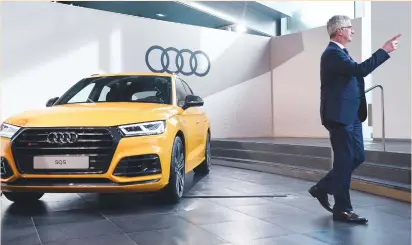  ?? (Lukas Barth/Reuters) ?? AUDI CEO Rupert Stadler arrives for the company’s annual news conference in Ingolstadt yesterday.