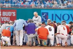  ?? ALEX BRANDON/ASSOCIATED PRESS ?? The Rev. Patrick J. Conroy, chaplain of the House of Representa­tives, prays as both teams gather before the Congressio­nal Baseball Game at Nationals Park in Washington, D.C., on Thursday night.