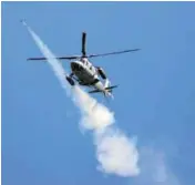  ??  ?? A Philippine Air Force attack helicopter fires a rocket during an assault on Maute fighters in Marawi yesterday.