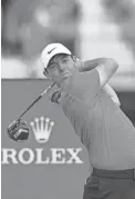  ??  ?? Rory McIlroy tees off during the final round of the British Open on Sunday. STEVE FLYNN/USA TODAY SPORTS