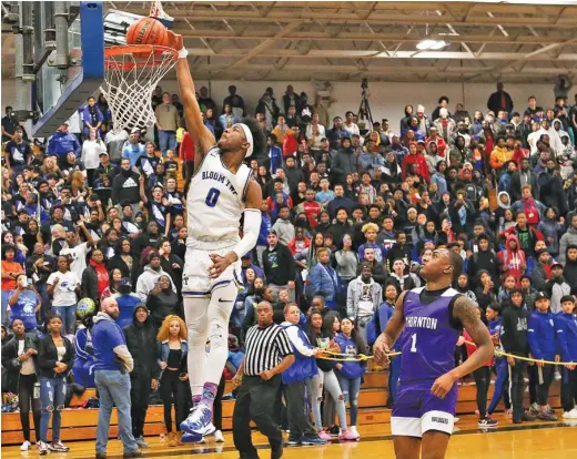  ?? ALLEN CUNNINGHAM/FOR THE SUN-TIMES ?? Bloom senior Keshawn Williams slams down two of his 23 points against previously undefeated Thornton on Tuesday.