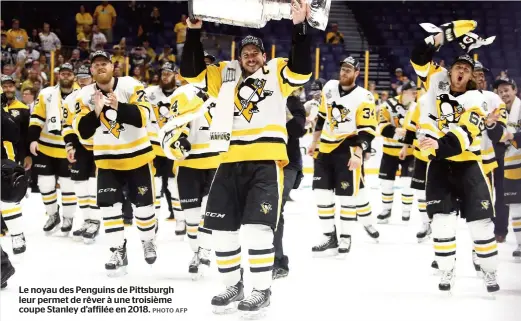  ??  ?? Le noyau des Penguins de Pittsburgh leur permet de rêver à une troisième coupe Stanley d’affilée en 2018.