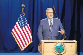  ?? DARRON CUMMINGS/AP ?? Gov. Eric Holcomb delivers his State of the State address virtually Tuesday in Indianapol­is.