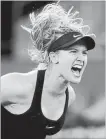  ?? GETTY IMAGES FILE PHOTO ?? Eugenie Bouchard celebrates match point against Maria Sharapova in Madrid in 2017.