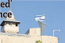  ?? ?? A surveillan­ce camera is pictured at the Ibrahimi mosque, also known as the Tomb of the Patriarchs, in the flashpoint Palestinia­n city of Hebron.