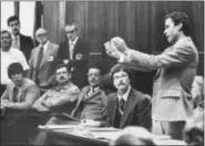  ?? THE ASSOCIATED PRESS ?? In this Monday file photo, Ted Bundy presents a motion during his murder trial in Miami. He complained that he could not work on his defense in a 9- by 7-foot cell. Bundy is charged with clubbing two young women to death in a sorority house in Tallahasse­e.
