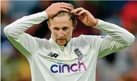  ?? GETTY IMAGES ?? Hard to take: Root despairs as England lose the plot