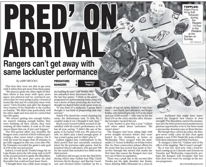  ?? John Munson ?? Summary Page 37
TOPPLED: Adam Fox is hit by Eeli Tolvanen during the Rangers’ 1-0 loss to the Predators at the Garden on Sunday.