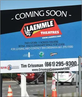  ?? Signal file photo ?? A sign advertises the Laemmle Theatres coming to Newhall in 2019.