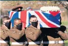  ??  ?? Soldiers from Captain Tom’s former regiment carry his coffin