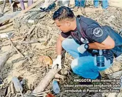  ??  ?? ANGGOTA polis memeriksa lokasi penemuan tengkorak oleh penduduk di Pantai Kuala Tatau.