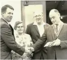  ?? ?? HERO HONOURED: In 1968, mayor Louis Gluckman presents Ronnie Samuel with a national medal (SA Life Saving Society’s Award) for his many sea and river rescues. Looking on are Ronnie’s parents Frieda and Mannie Samuel.