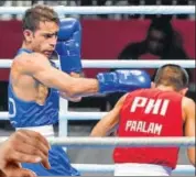  ?? PTI ?? Amit Panghal (in blue) won India’s only gold medal in boxing at the 2018 Asian Games.