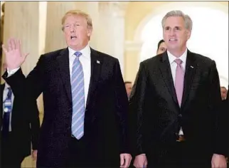  ?? Mandel Ngan AFP/Getty Images ?? PRESIDENT TRUMP with House Minority Leader Kevin McCarthy, a Bakersfiel­d Republican.