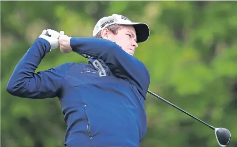  ??  ?? BACK IN BLIGHTY: Robert Macintyre on the sixth tee yesterday on his way to a one-under-par 71.