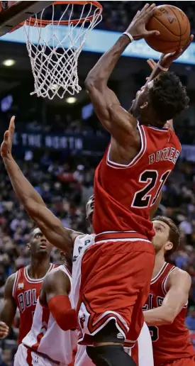  ?? USA TODAY SPORTS ?? CHICAGO Bulls guard Jimmy Butler soars for a basket against the Toronto Raptors in their match at Air Canada Centre.
