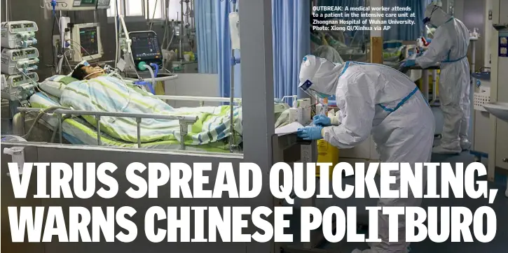  ??  ?? OUTBREAK: A medical worker attends to a patient in the intensive care unit at Zhongnan Hospital of Wuhan University. Photo: Xiong Qi/Xinhua via AP