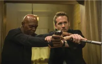  ?? JACK ENGLISH/THE ASSOCIATED PRESS FILE PHOTO ?? The Hitman’s Bodyguard led the box office for a third time this weekend, earning $13.4 million through Monday.