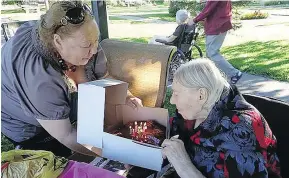  ??  ?? The Ottawa police elder-abuse unit is investigat­ing a nursing home after Luba Ignatieva, right, was discovered with maggots infesting a wound on her leg, which required twice-weekly dressings.